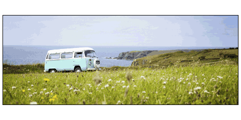 Panoramic poster of a VW camper van parked on a cliff-side meadow