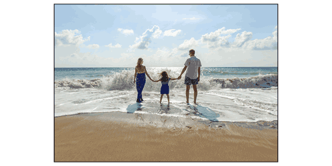 A4 poster of a family at the seaside