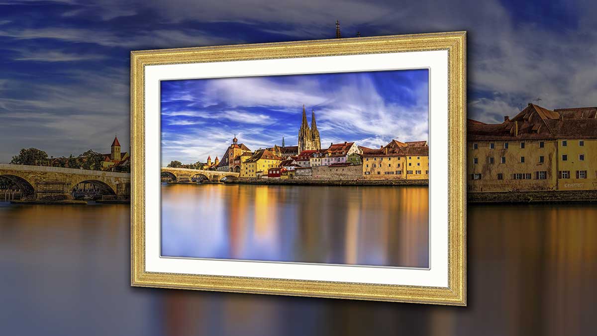 Image showing a cityscape printed and framed in a gold frame