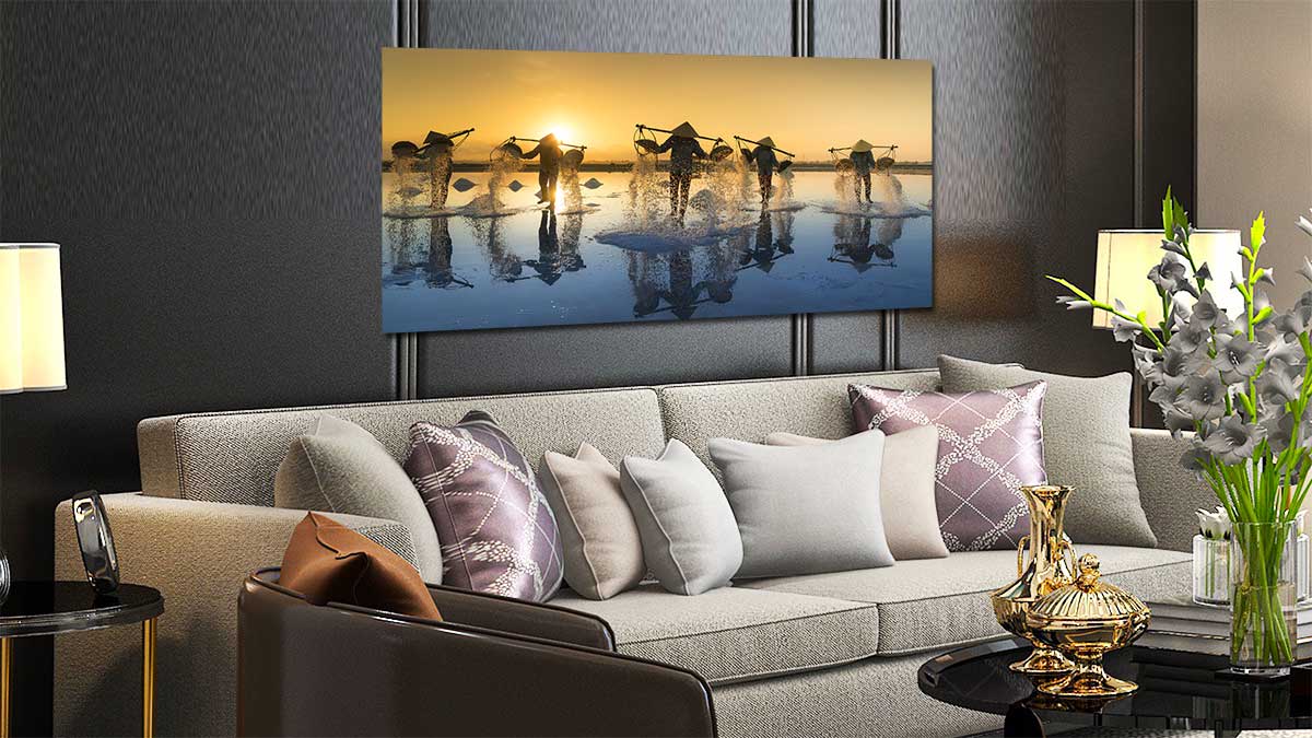 Panoramic poster of a holiday landscape hung on the wall above a settee