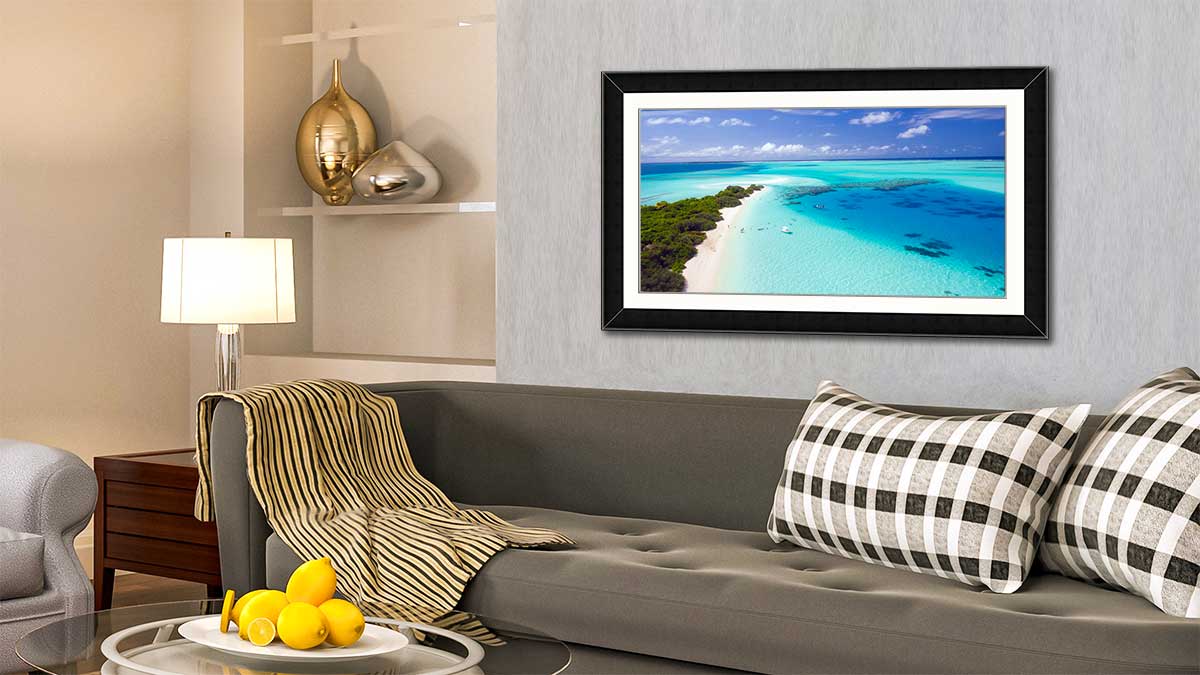 Panoramic picture of a beautiful tropical sea in a black frame with mount, hanging on a wall in a sitting room