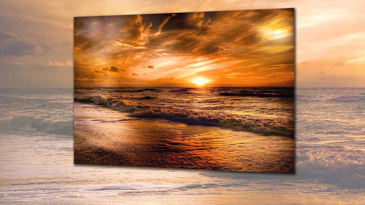 Picture of a deep orange seascape sunset printed on a poster